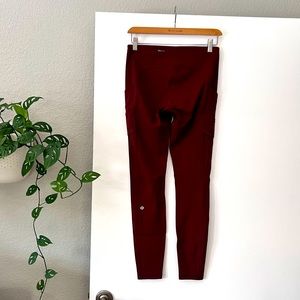 Lulu leggings, in like new condition. Size 6. Pockets on the side/back.Burgundy